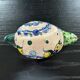 Painted stoneware snail