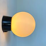 Pair of vintage Raak opaline and Bakelite wall lights, Netherlands 1970s