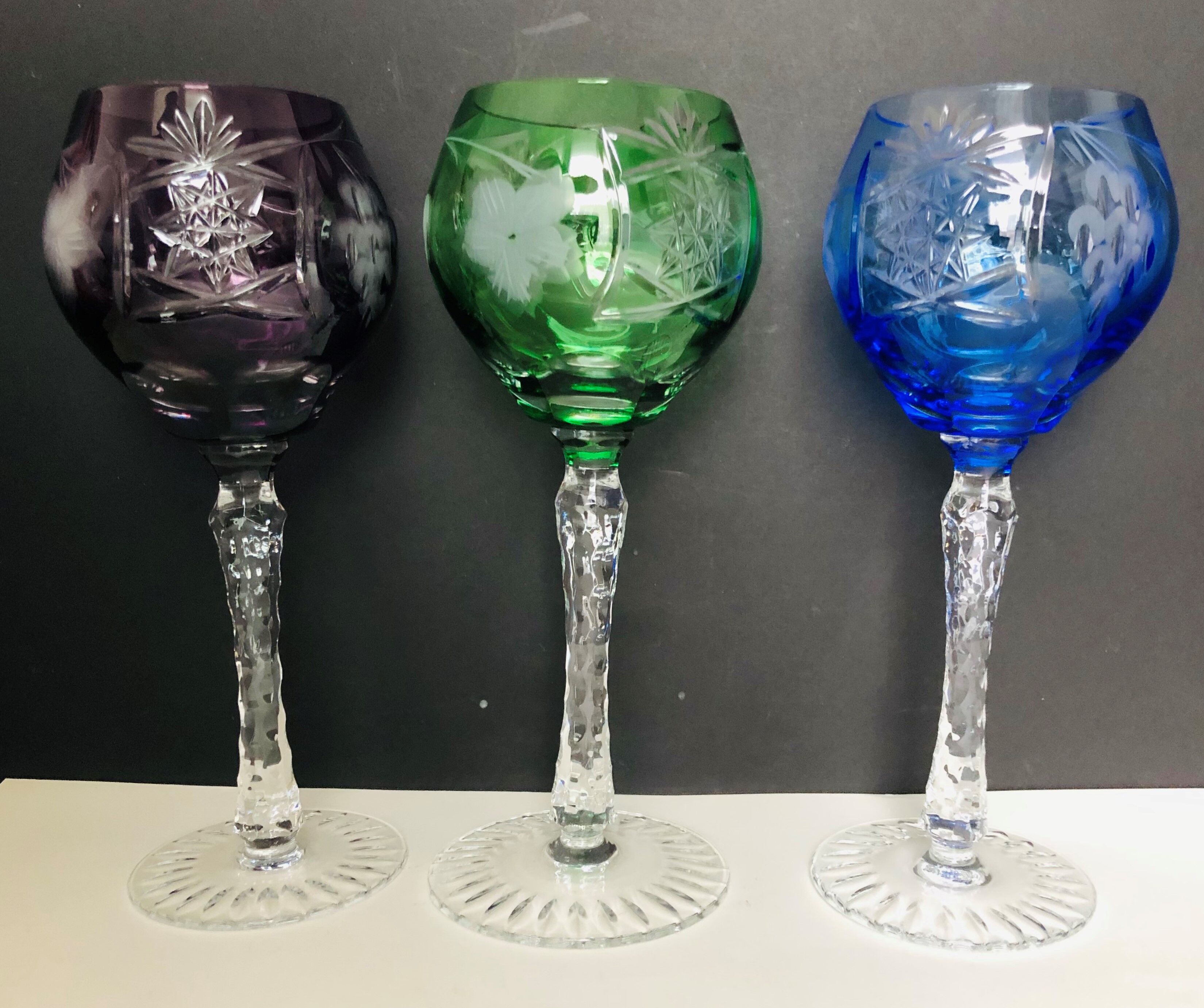 Set of six colored cut crystal wine glasses