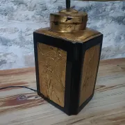 Large ceramic lamp with an Asian theme.