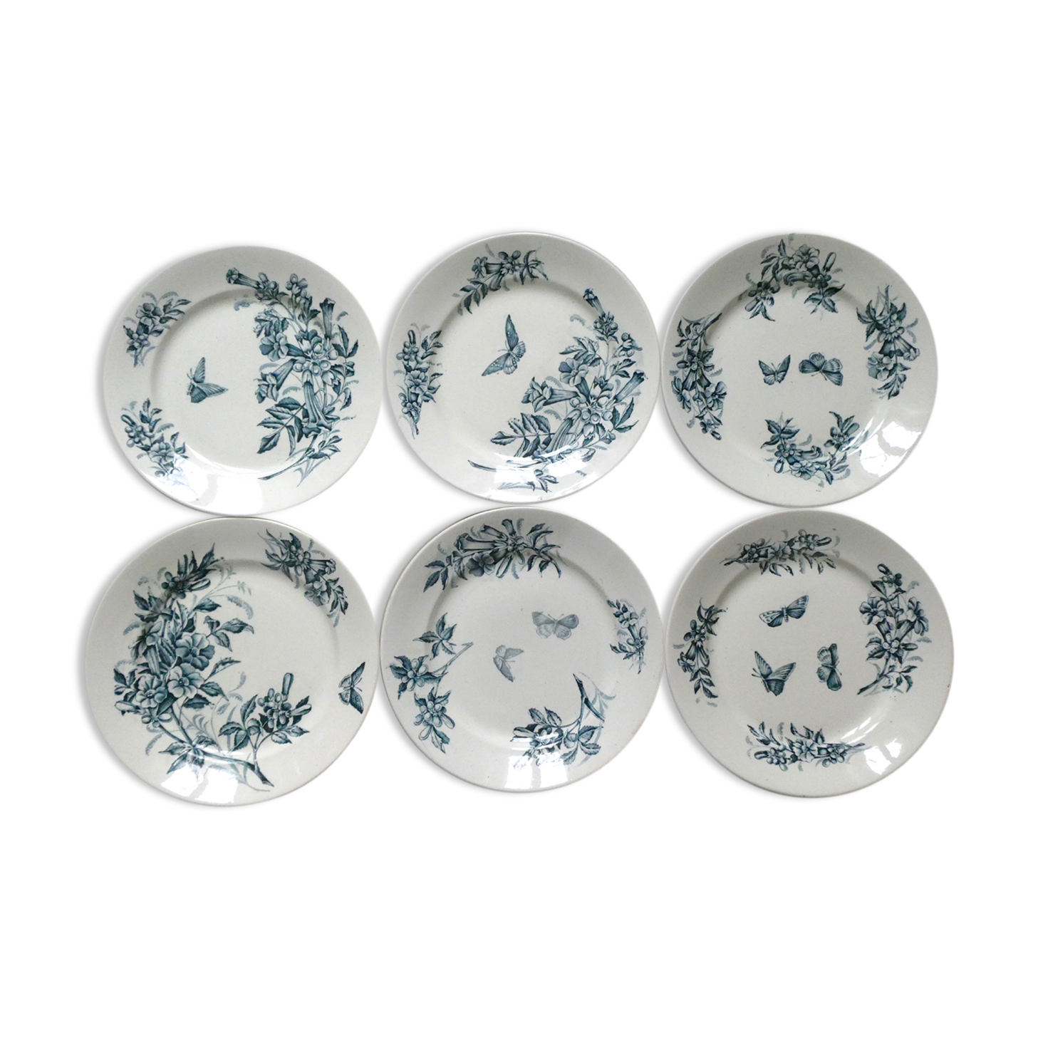6 assiettes plates Badonviller, papillons et fleurs, 1900