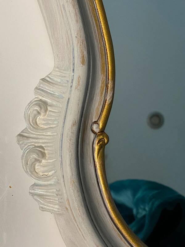 Magnificent patinated and gilded baroque style mirror