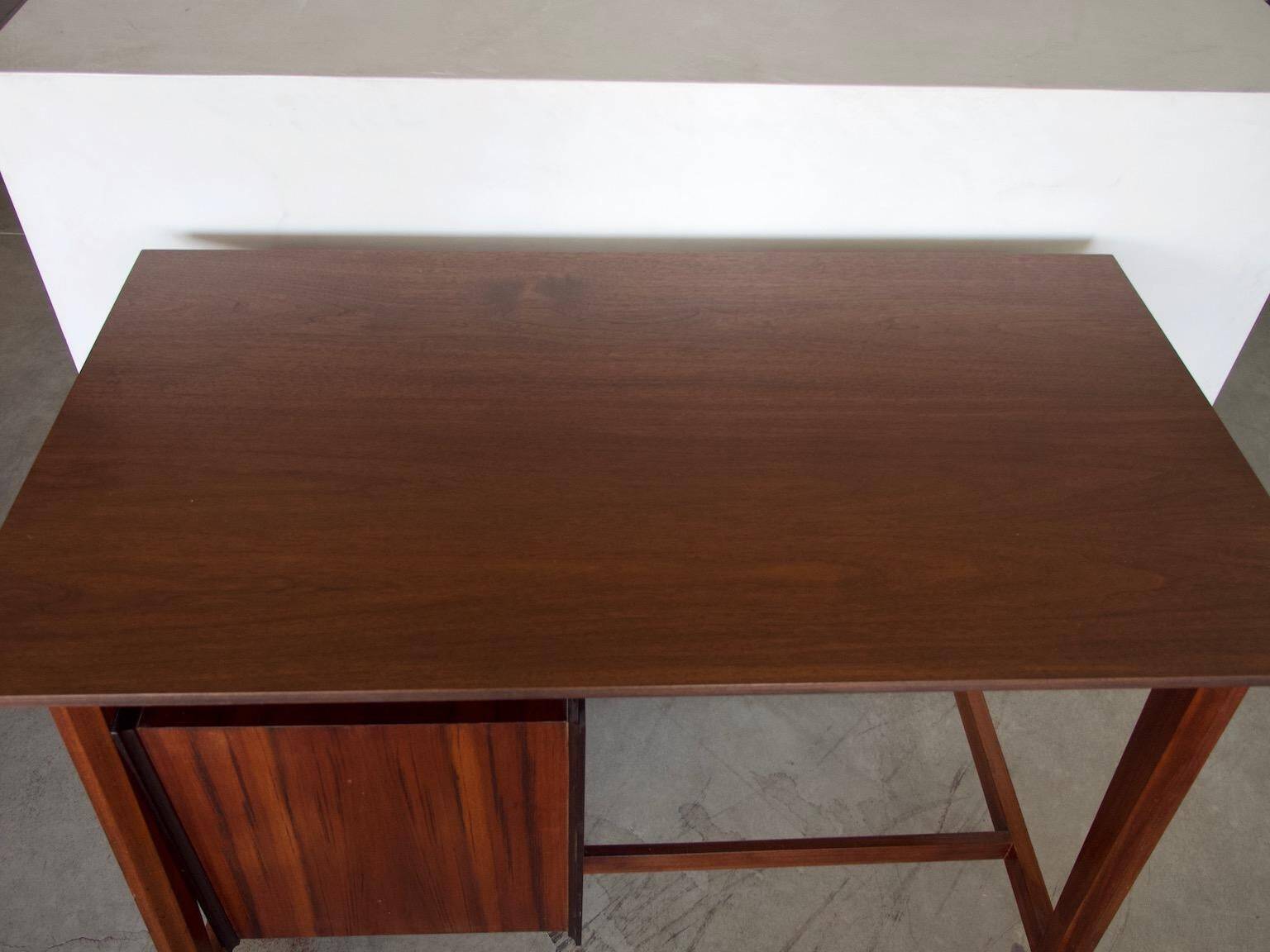 Small Italian wooden desk with brass details.