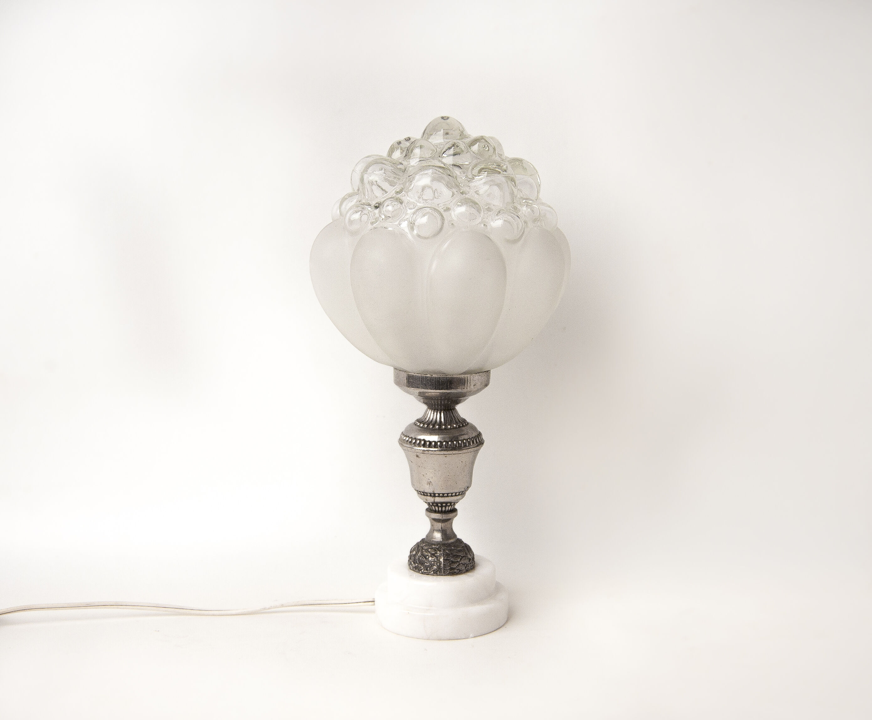 Bedside lamp in moulded glass