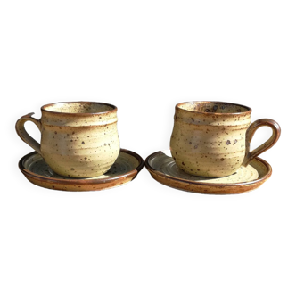 Pair of enameled stoneware cups/saucers
