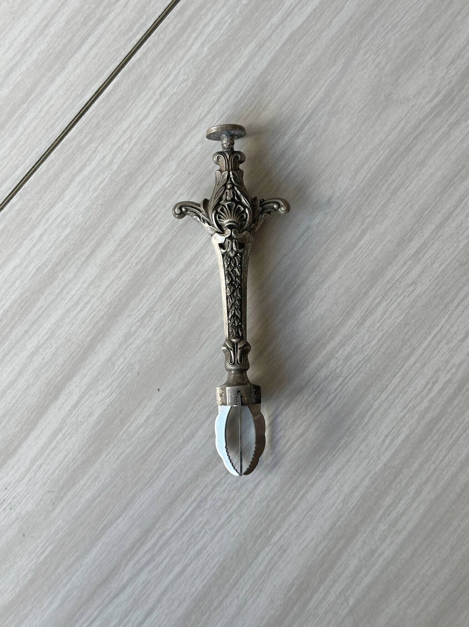 Antique metal sugar tongs
