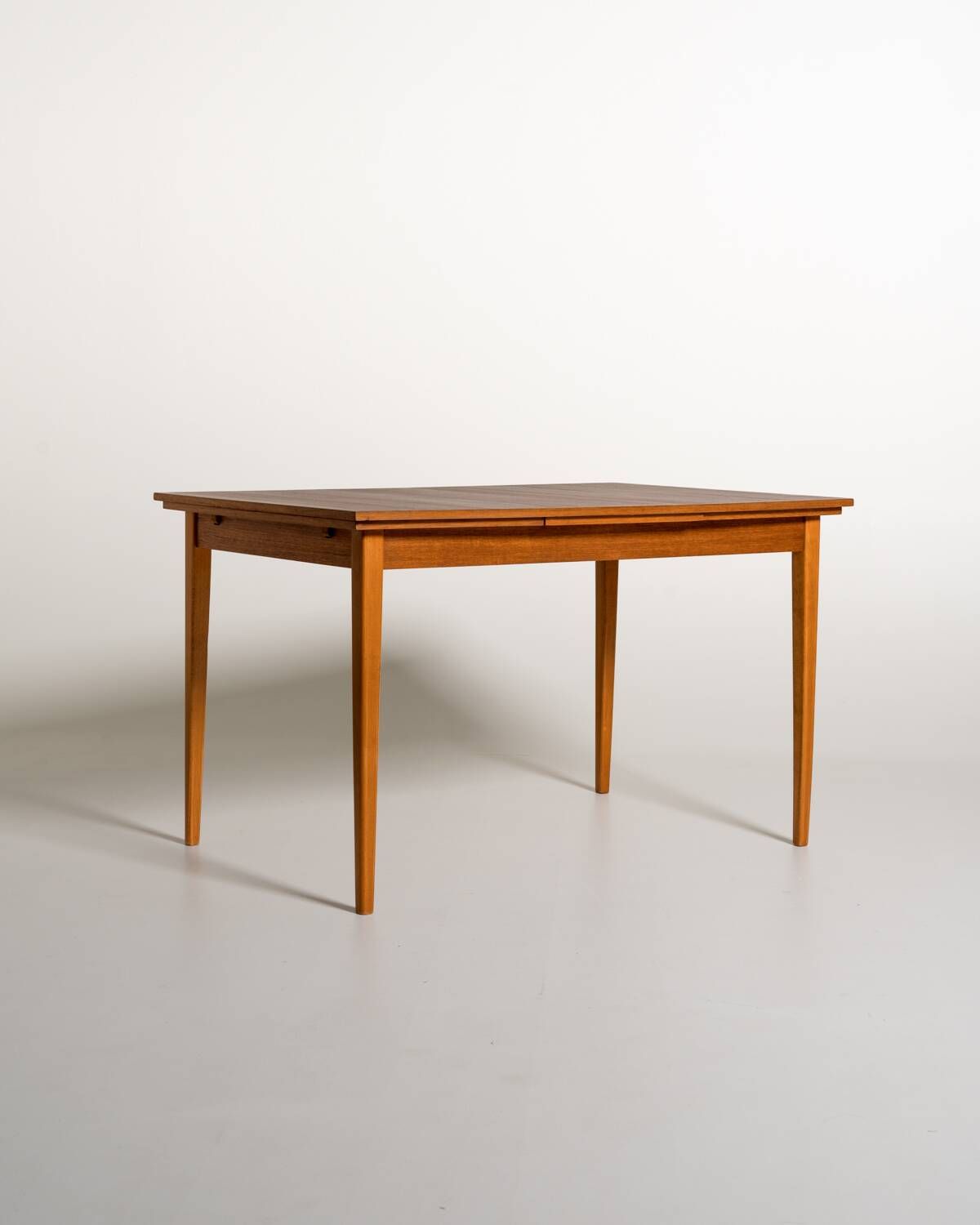 Scandinavian extendable teak and beech dining table, 1950s-60s