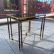 Pair of vintage nesting tables in gilded bronze and oxidised blue mirror, style