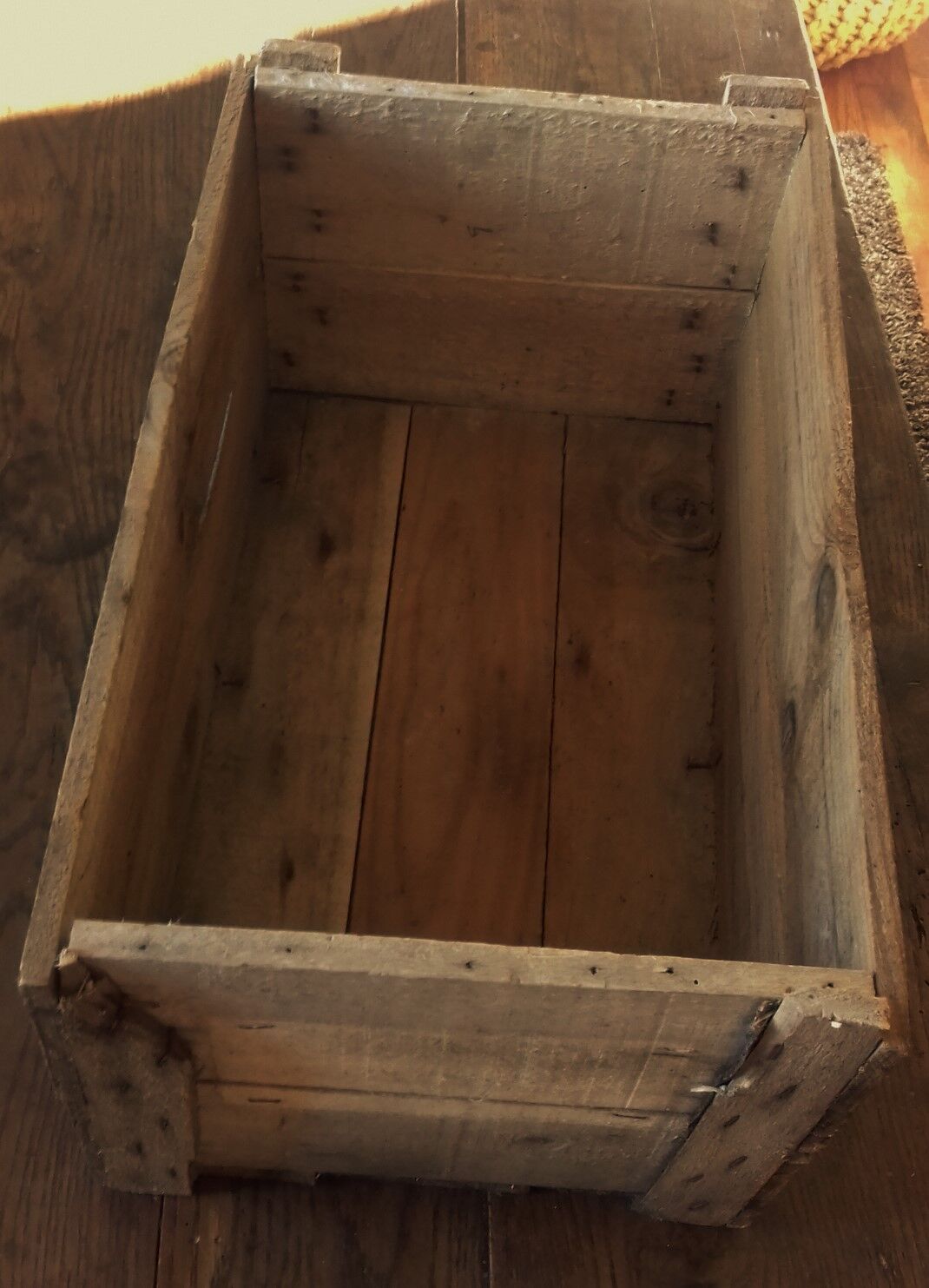 Wooden case with letters in black inck