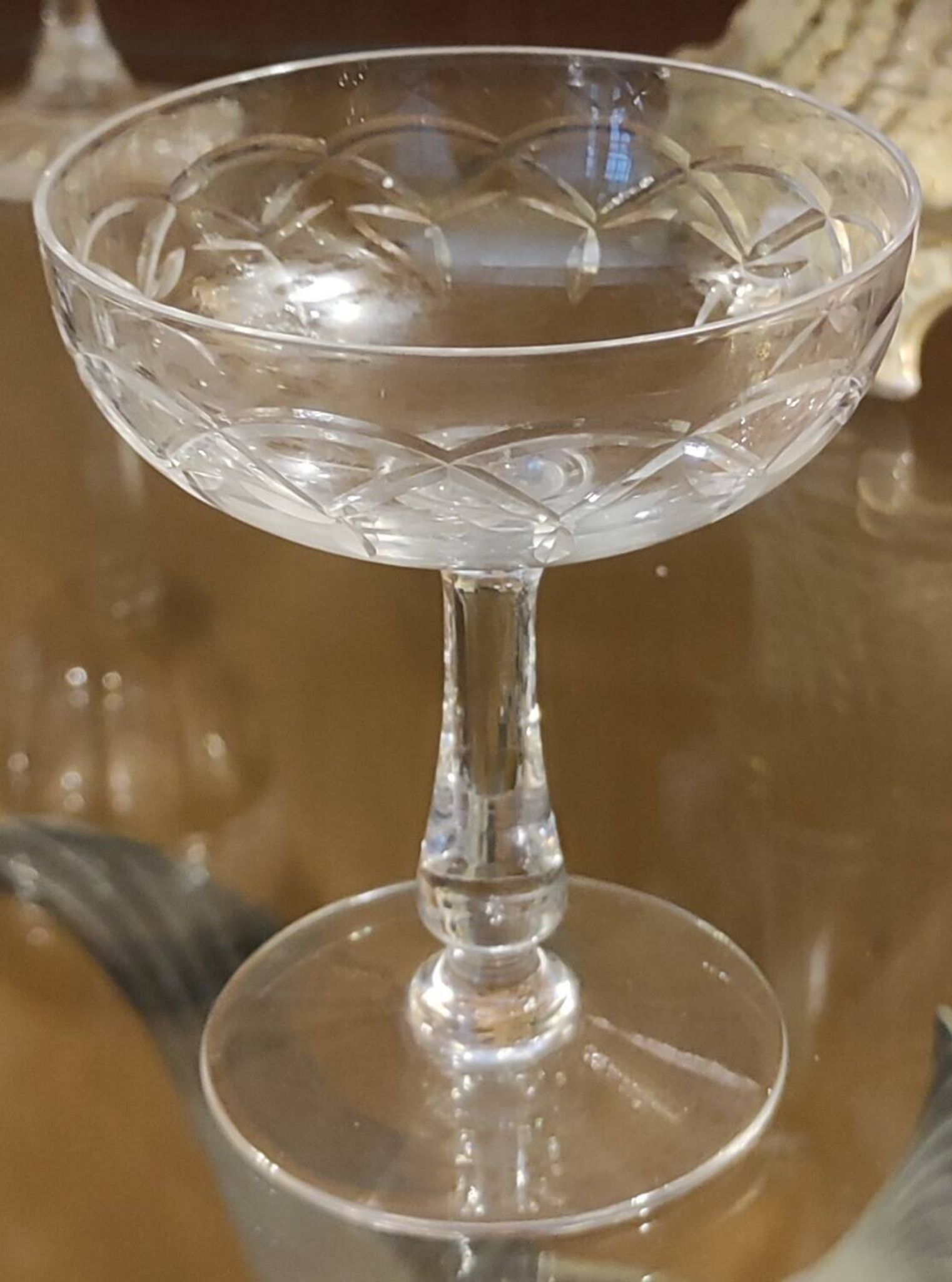 Series of 11 cut crystal champagne glasses