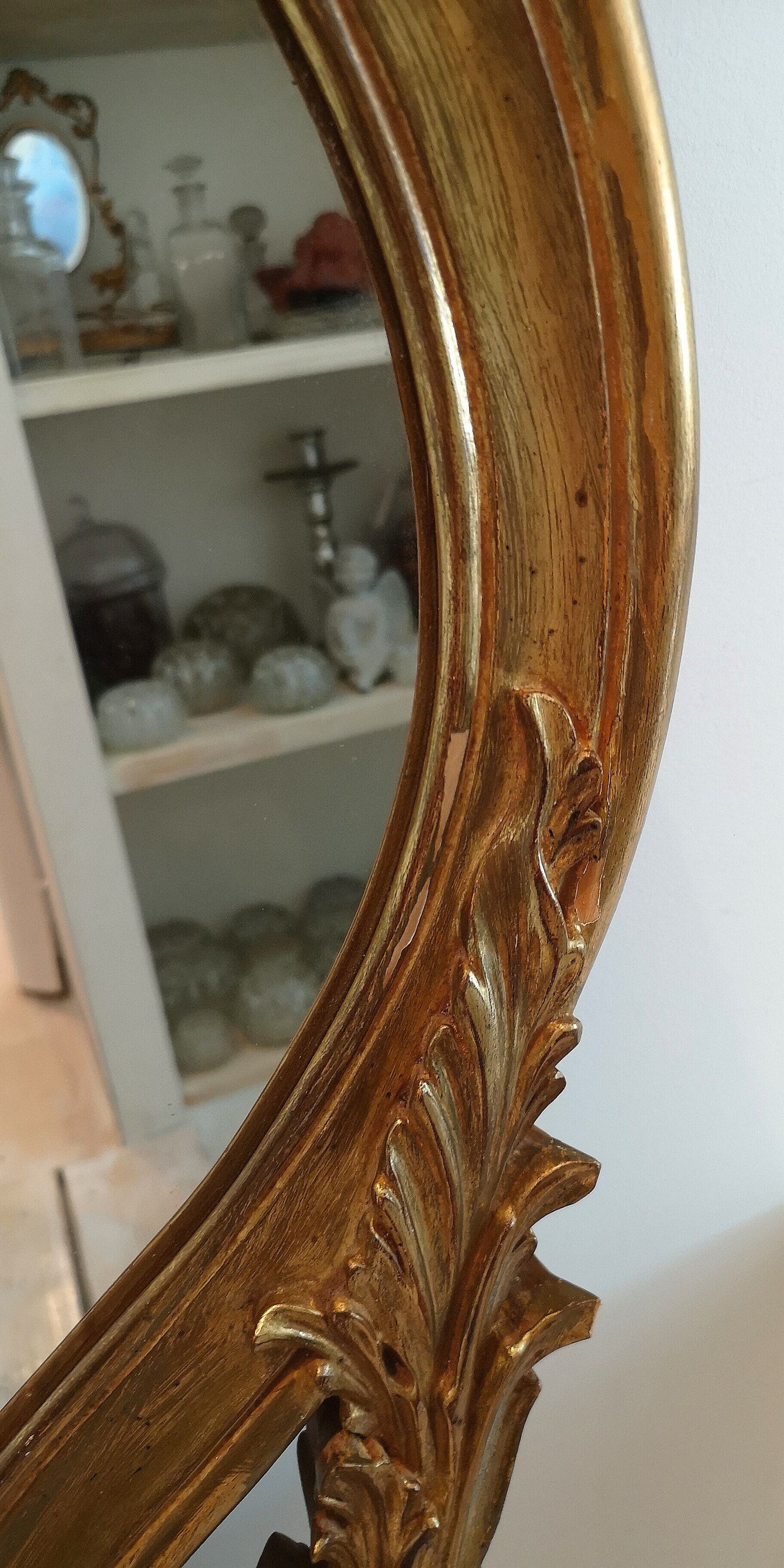 Elongated oval baroque gilded mirror