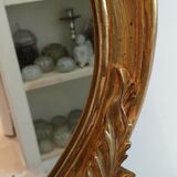 Oval baroque gold mirror
