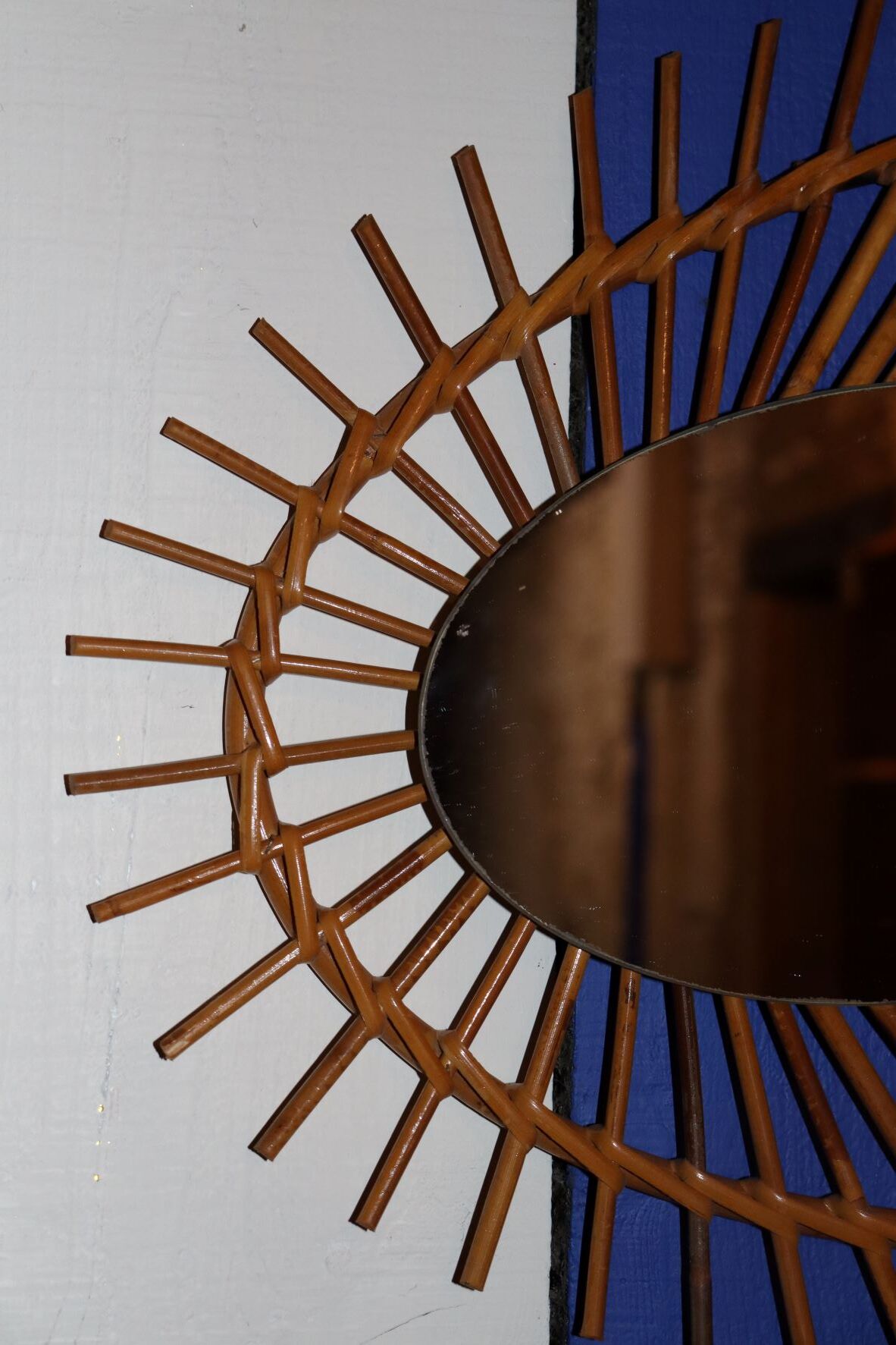 Oval rattan mirror
