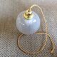 Glass ball suspension
