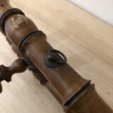 Wooden coat rack with swivel hooks