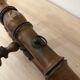 Wooden coat rack with swivel hooks