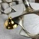 Pair of silver and gold metal candlesticks