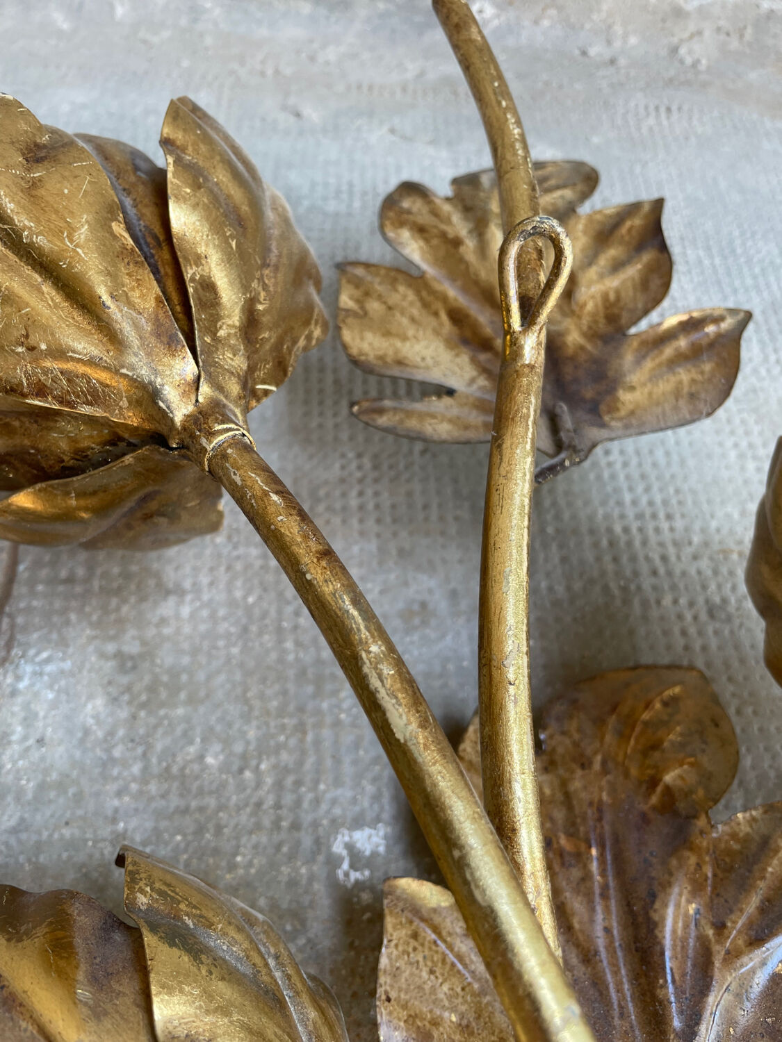 Golden wall lamp foliage