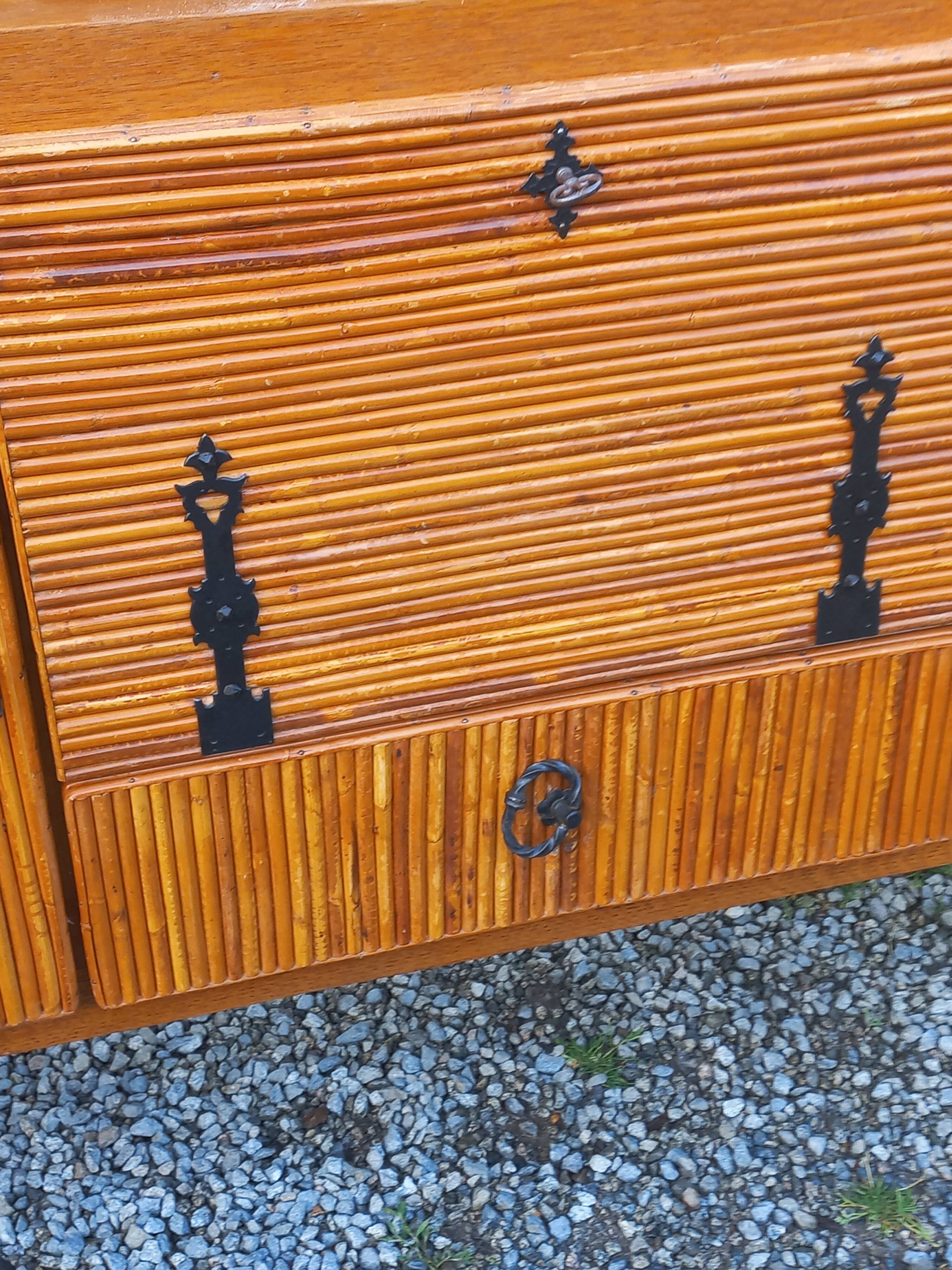 Bamboo and rattan enfilade attributed to Audoux and Minet.
