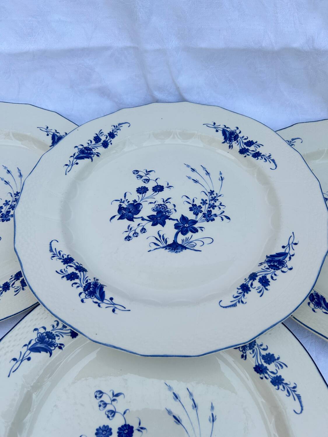 Set of 4 Bleu de Tournay iron earth plates