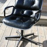 Pollock black leather reclining armchair with fixed ends