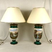 Large pair of 19th century polychrome porcelain vases decorated with landscapes, mounted as lamps