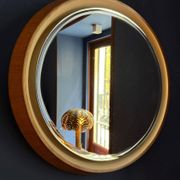 Backlit mirror designed by Gio Ponti in wood and lacquer. Italy, 1970s.