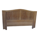 Headboard for a 160 bed in solid walnut with waxed finish.
