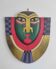 Handcrafted decorative wall mask made of painted wood.
