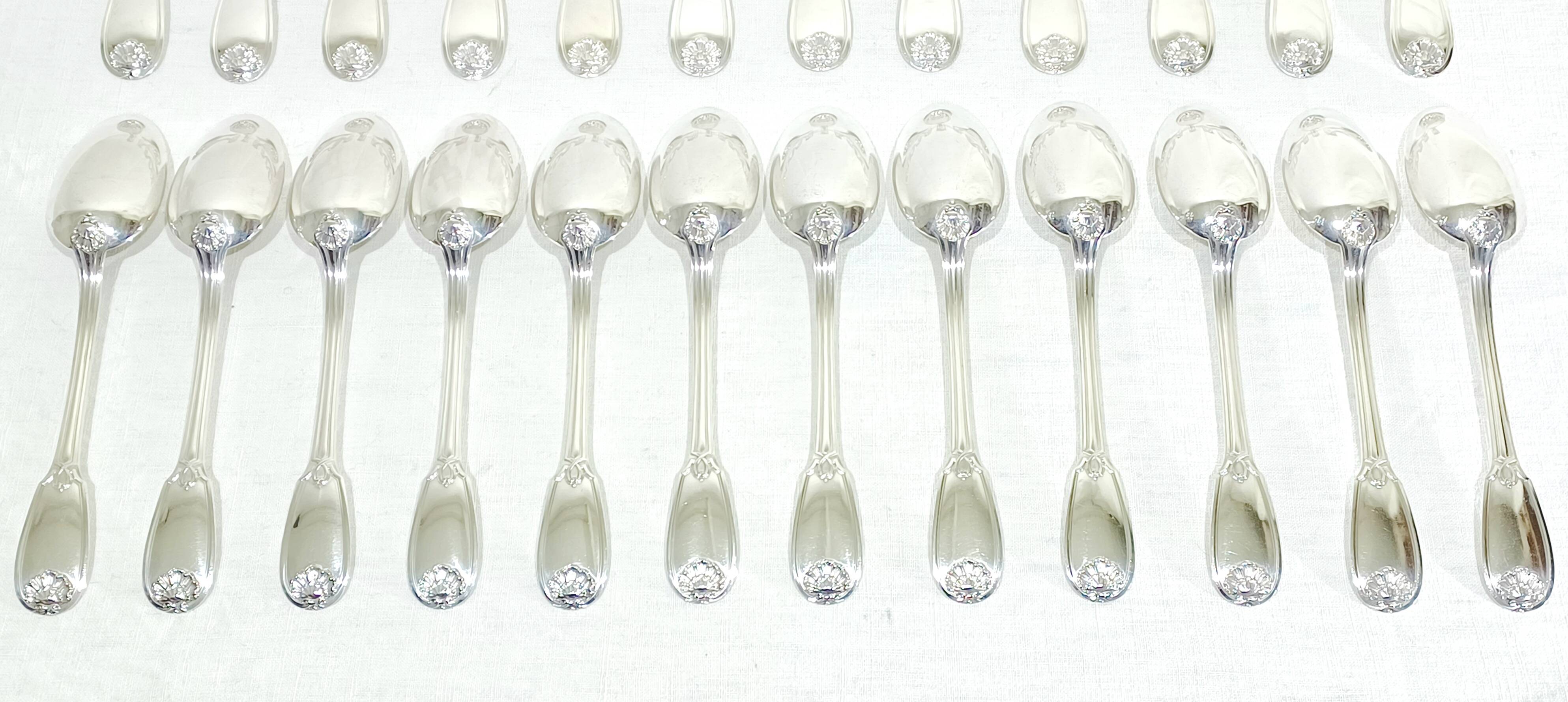 12 Louis XIV style silver cutlery sets