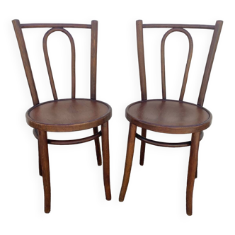 Deux anciennes chaises bistrot au décor serigraphié