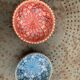 Two bowls, enameled ceramic cups, red and blue, artisanal, hand painted made in Italy