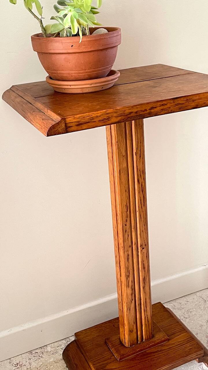 Vintage solid oak saddle plant holder