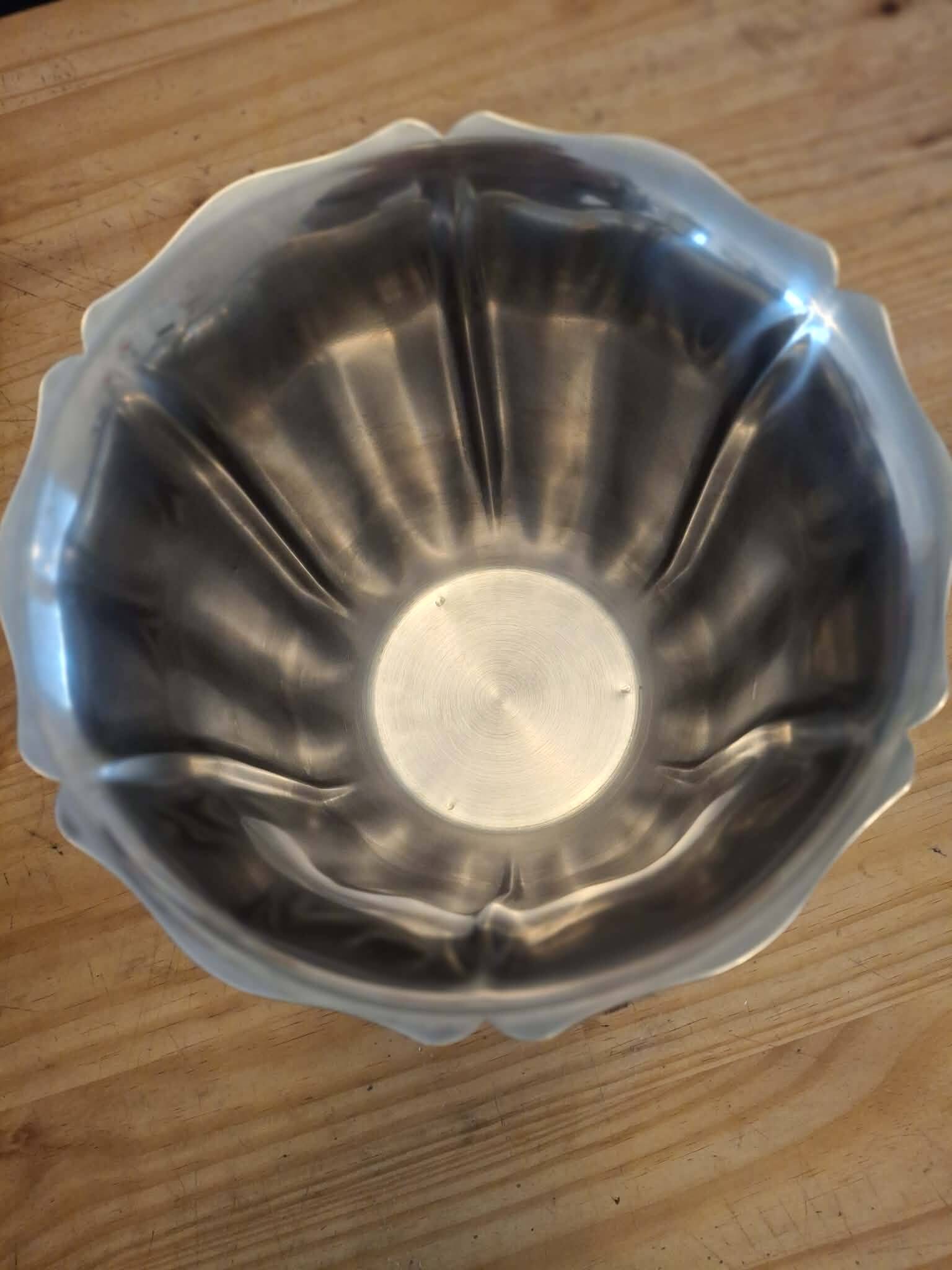 Elegant stainless steel champagne bucket signed by Guy Degrenne, made in France.