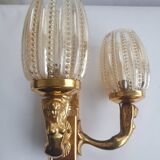 Golden bronze wall lamp with mermaids for an old bathroom.