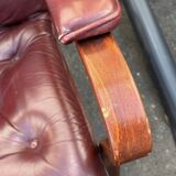 Scandinavian armchair with footrest