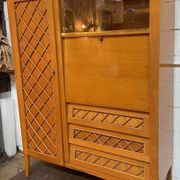 Wardrobe, desk, wooden and rattan chest of drawers, 1960s.