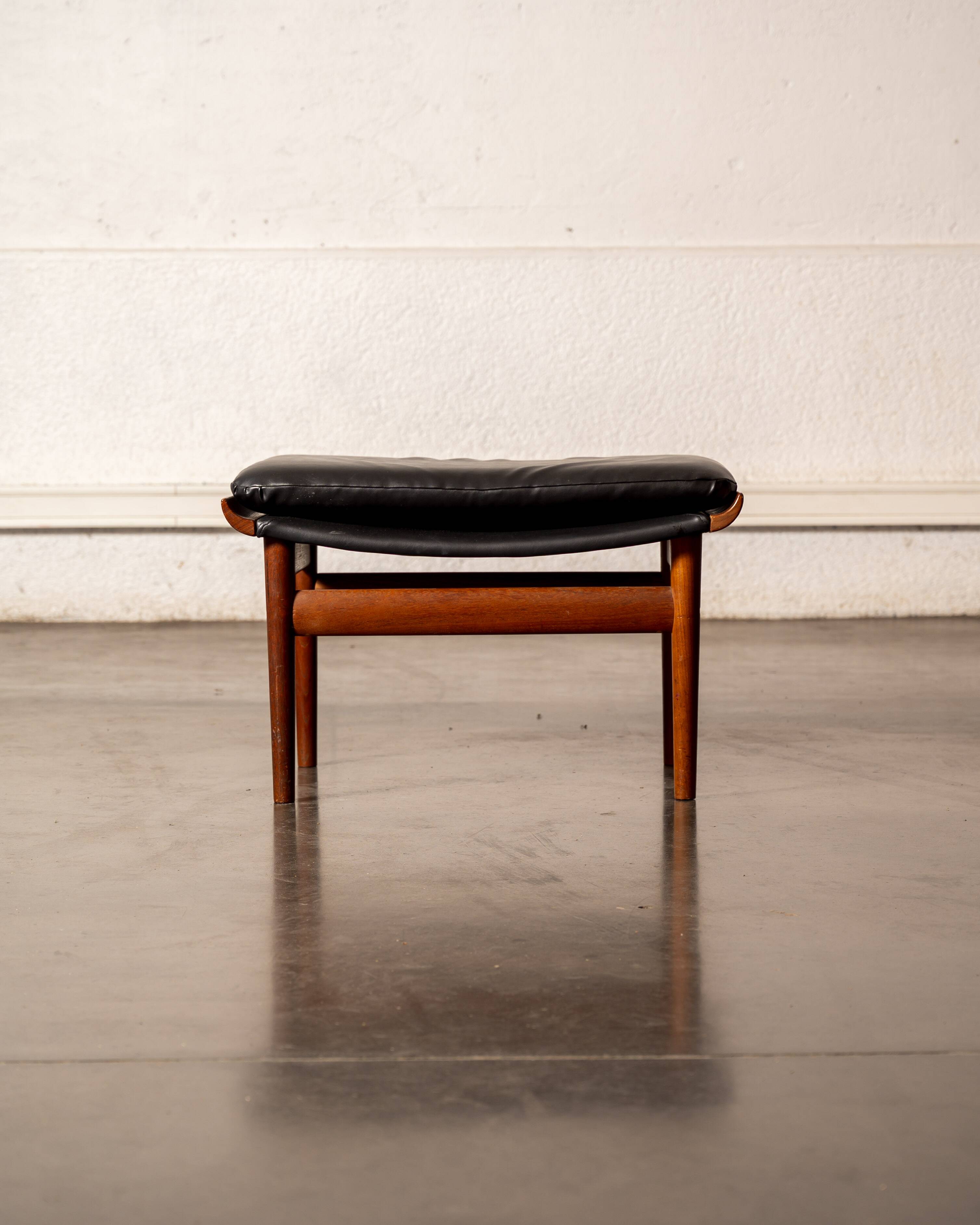 Finished Juhl armchair and its ottoman.