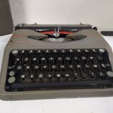Old typewriter " hermes baby " swiss keyboard azerty
