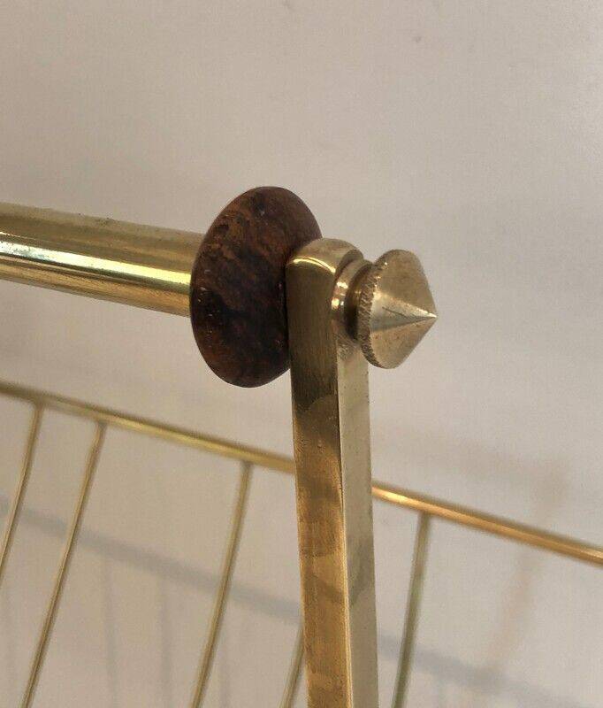 Brass and wood magazine rack, in the style of Cesare Lacca.