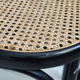 Curved wood and cane stool