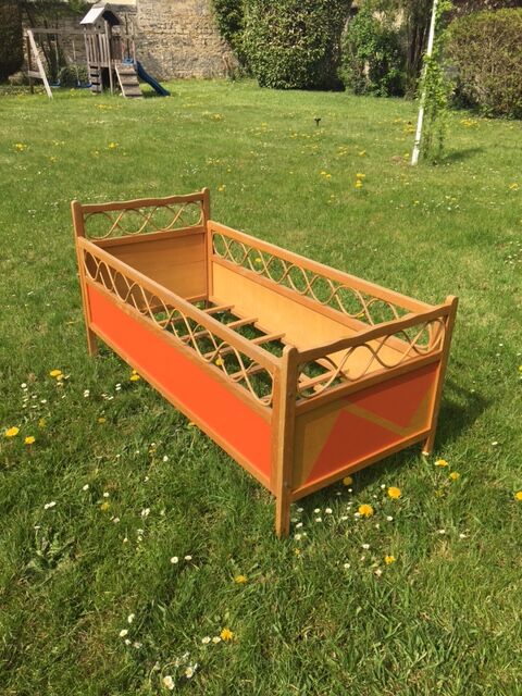 Wood and rattan baby bed