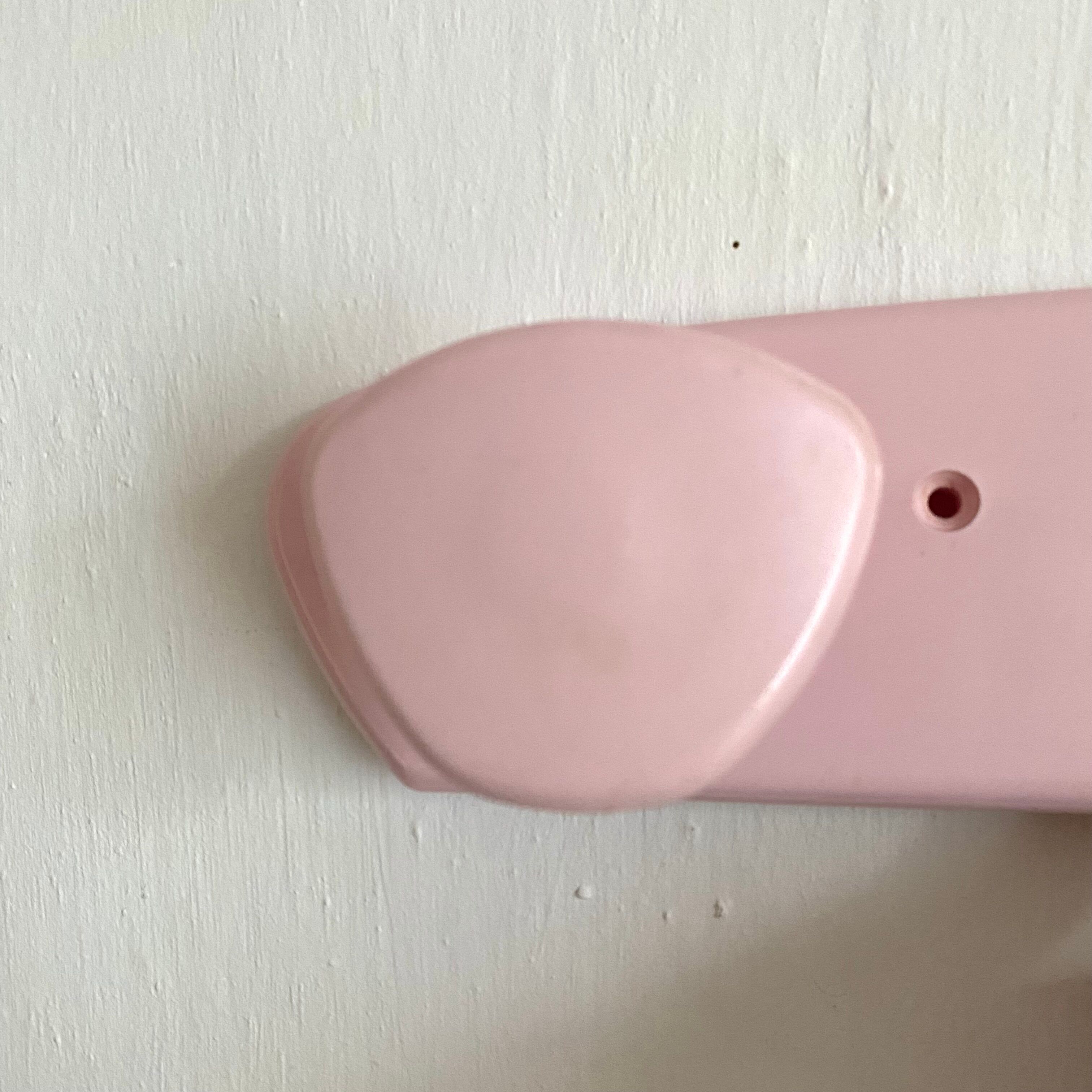 Vintage pink wall coat racks
