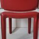 Red leather chairs by Arper