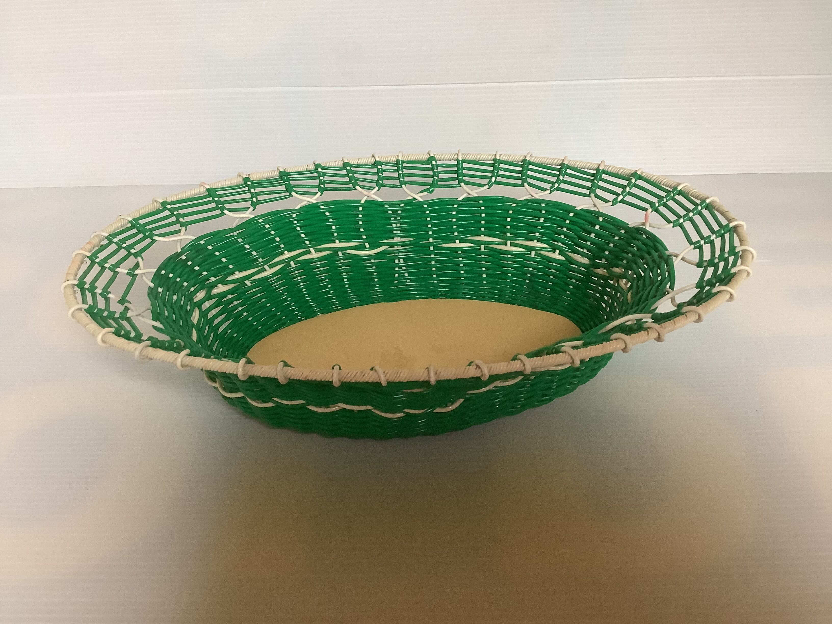 Old green scoubidou basket