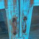 Glass cabinet in old blue wood