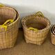 Set of 9 wicker trundle baskets