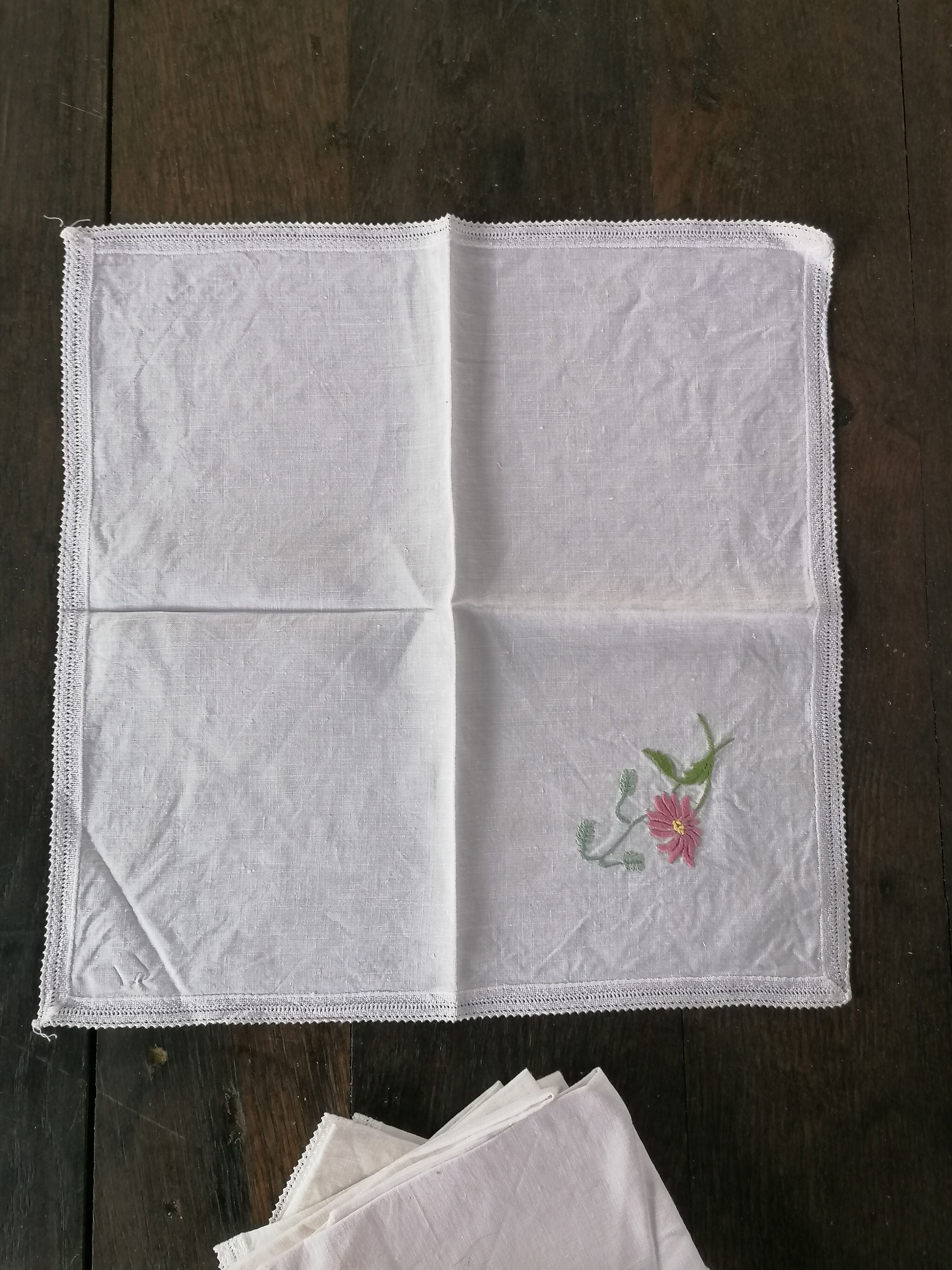 Hand embroidered "flower" and lace embroidered napkins