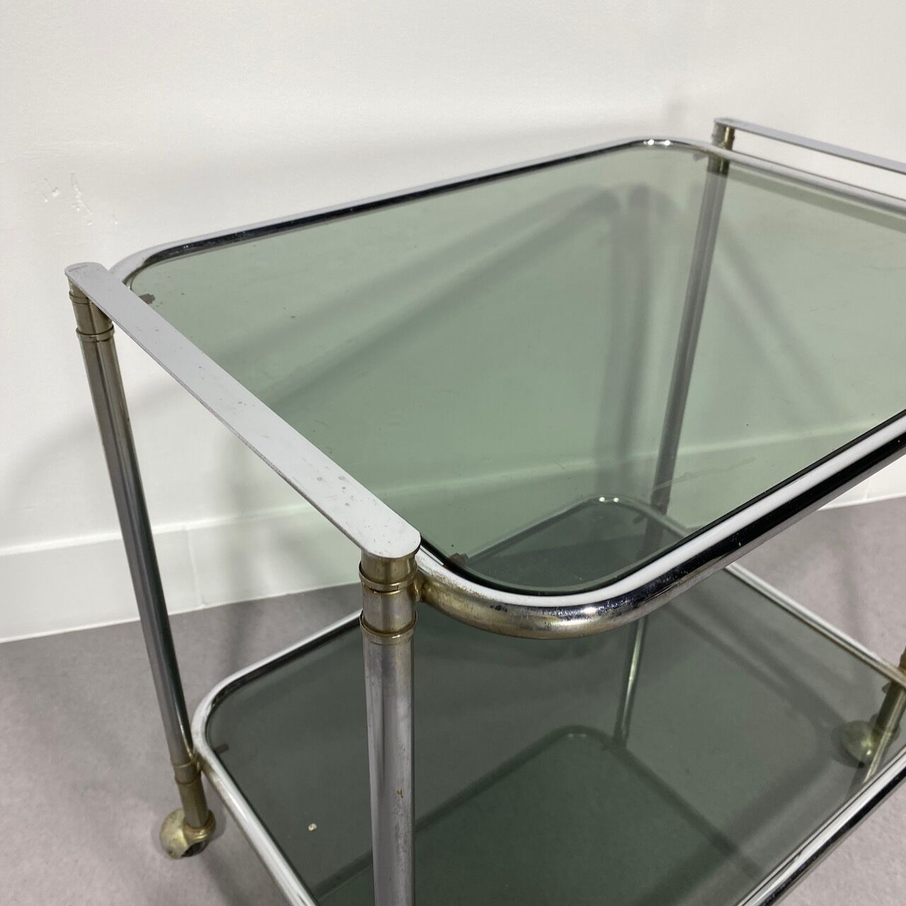 Chrome bar cart with green fume glass