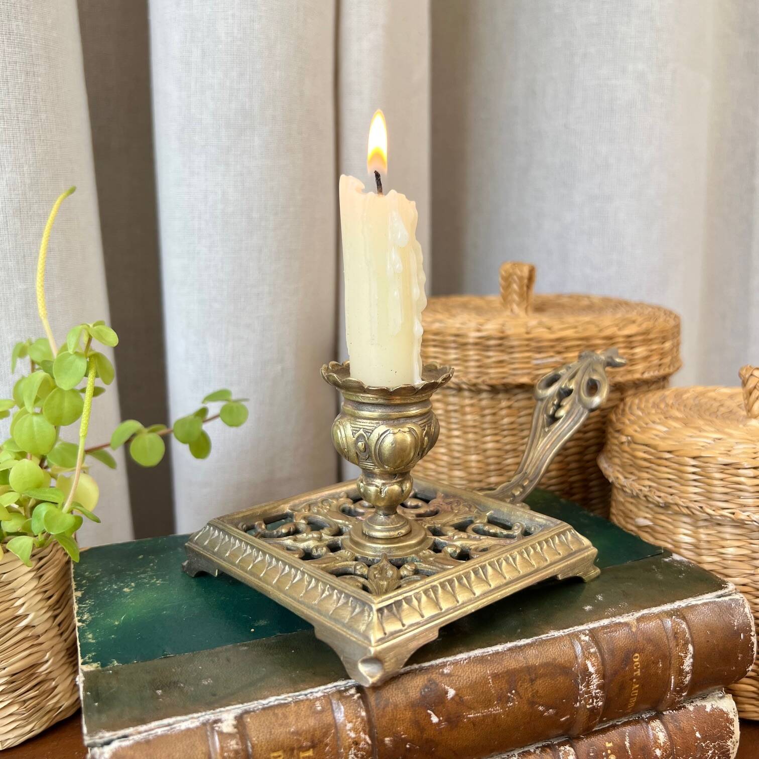 Bronze cellar rat candle holder